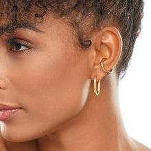 Load image into Gallery viewer, A dainty coil ring to add a little more detail to your everyday fit.   Materials: 18k gold plated stainless steel  Measurements: 1.4 cm   Allergy Information: Hypoallergenic
